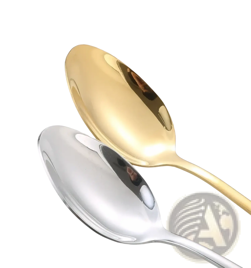 Two stainless steel spoons with polished gold and reflective silver finishes from a stainless steel 4-piece flatware set