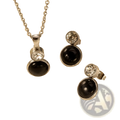 Silver-toned stainless steel black onyx necklace and earring set with clear crystal accents for elegant wear