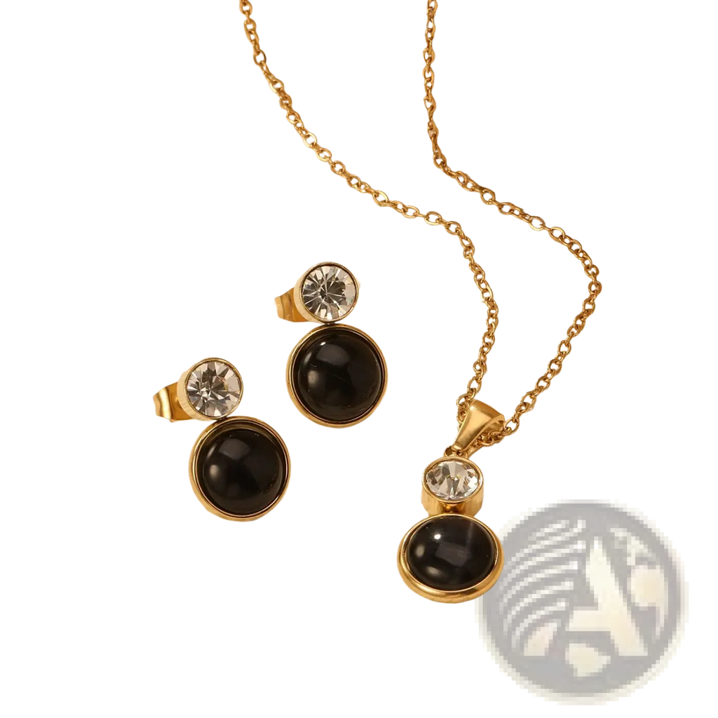 Gold-toned stainless steel black opal necklace and earring set with black onyx and clear crystal accents