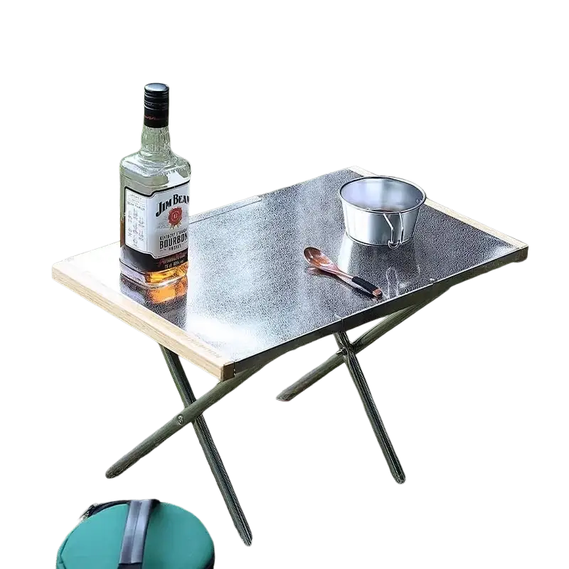 Silver-toned stainless steel camping table with wooden edge foldable design and storage bag for outdoor furniture use