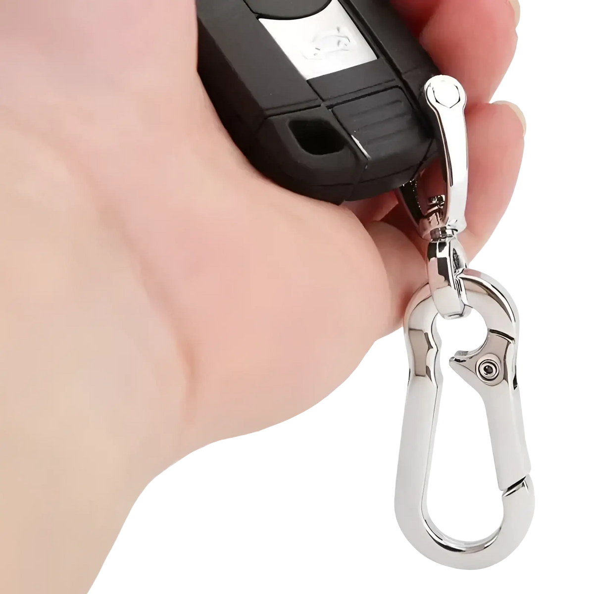 Silver stainless steel carabiner car keychain attached to a black car key fob for secure key organization