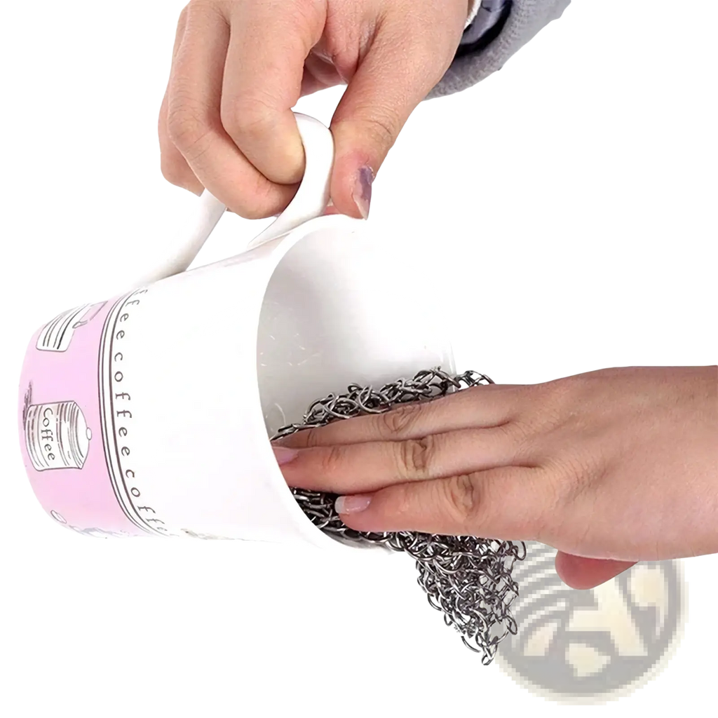 Silver stainless steel chainmail cast iron pot scrubber with textured interlocking link design for heavy-duty cleaning