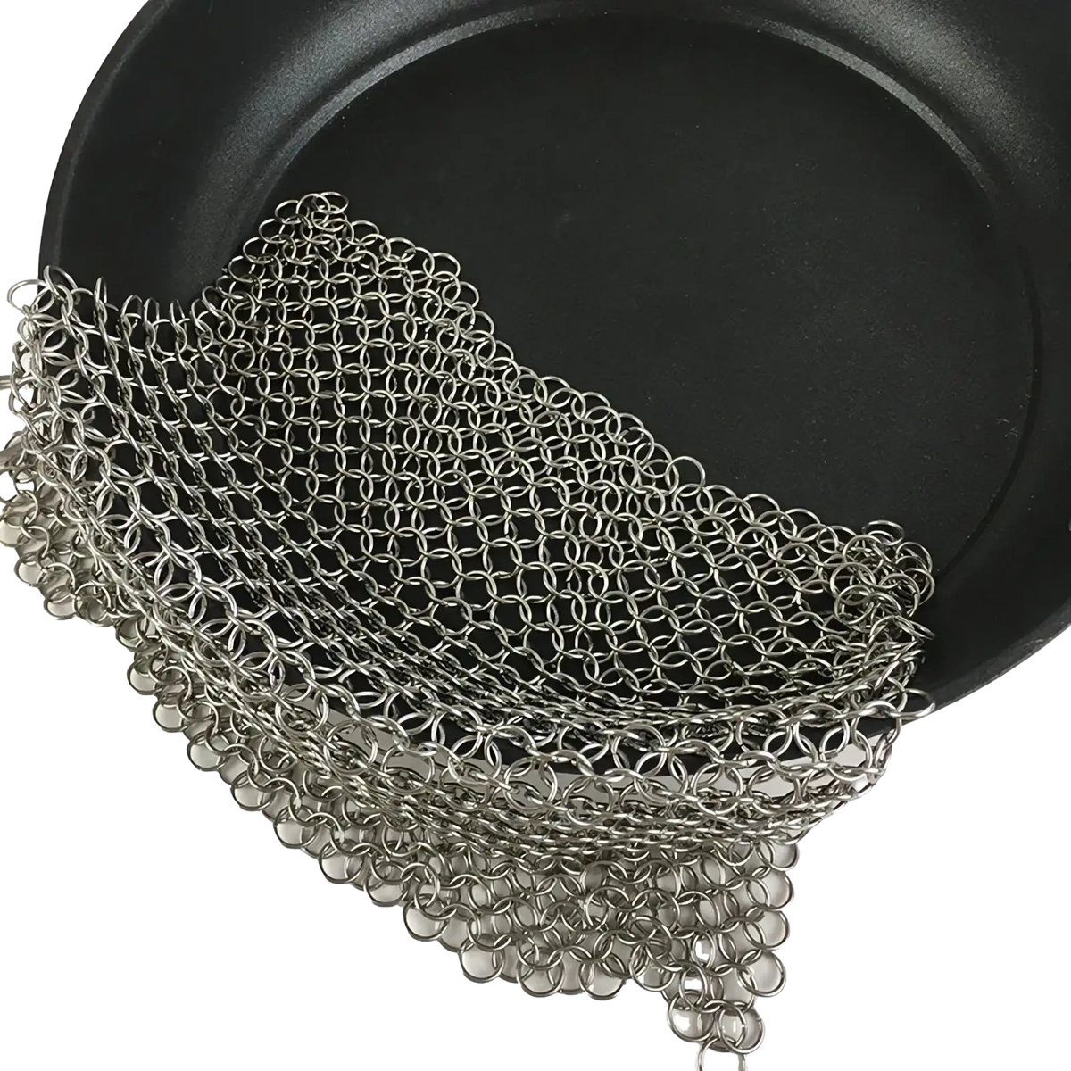 Silver-colored stainless steel chainmail cast iron pot scrubber with flexible interlocking ring design