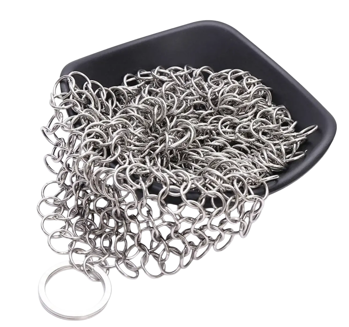 A pile of silver stainless steel chainmail cast iron scrubber links in a black dish with one ring beside it