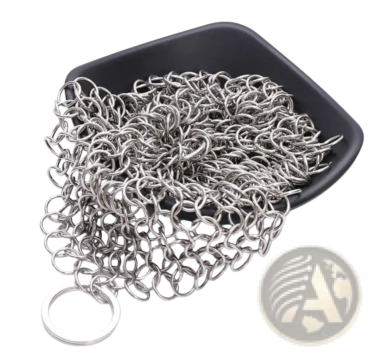 A pile of silver stainless steel chainmail cast iron scrubber links in a black dish with one ring beside it