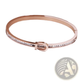 Rose gold stainless steel crystal bangle bracelet with sleek band, sparkling stones, and elegant buckle closure