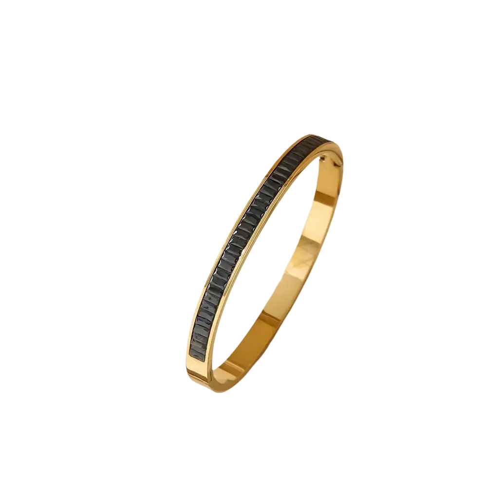 Gold-toned stainless steel crystal bangle bracelet featuring a sleek design with embedded black rectangular stones