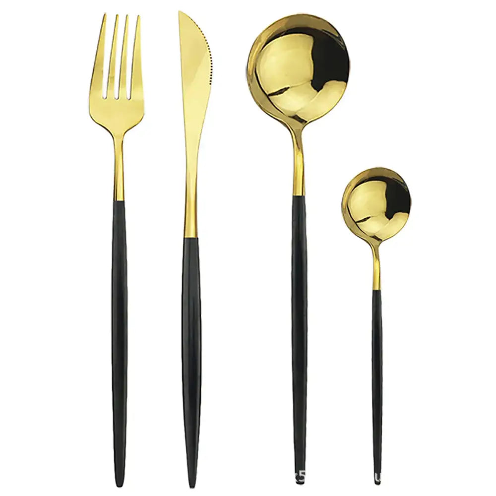 Modern gold polished stainless steel flatware set with gold polished heads and black matte finished handles in sleek design