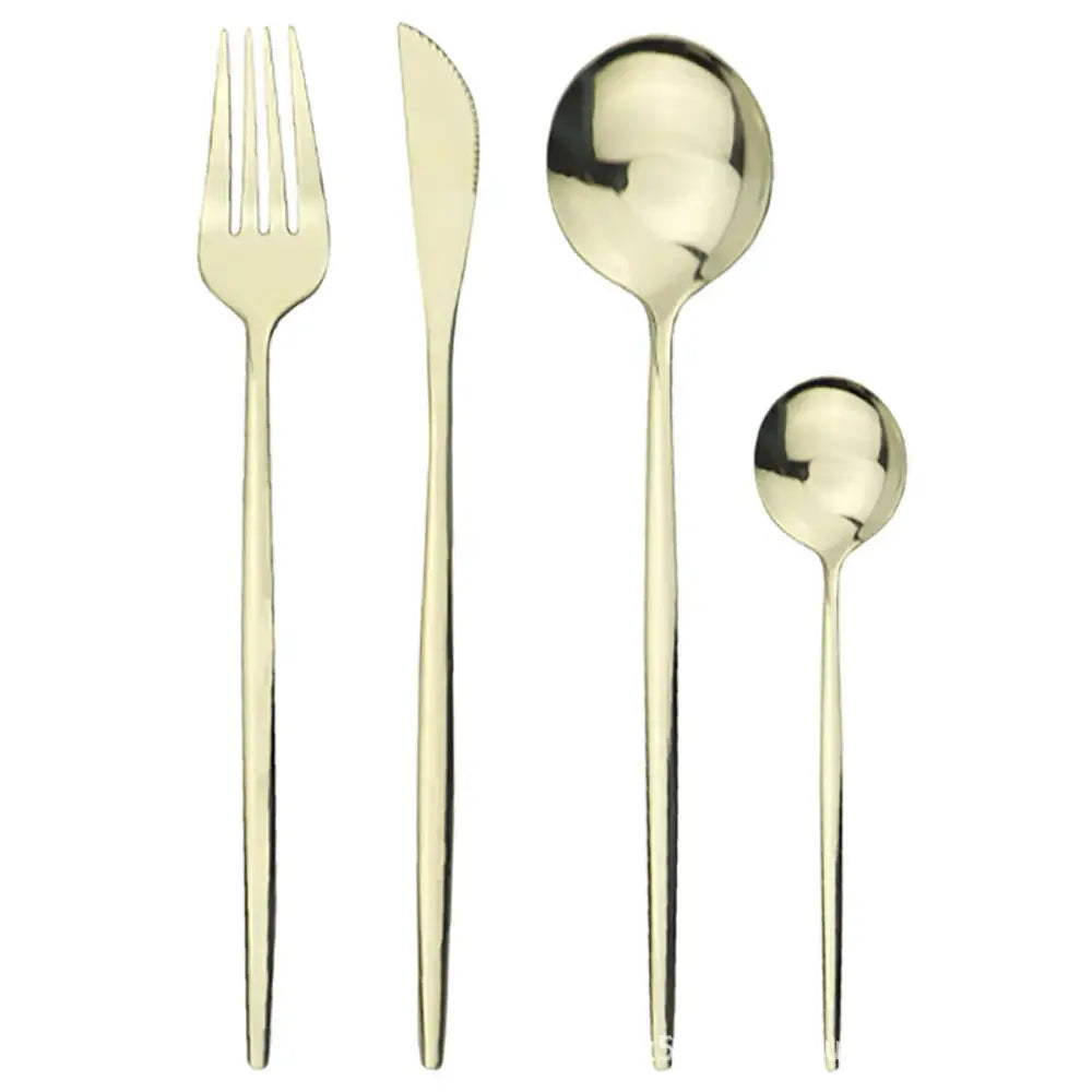 Modern gold polished stainless steel flatware set with minimalist fork knife and two spoons with sleek handles