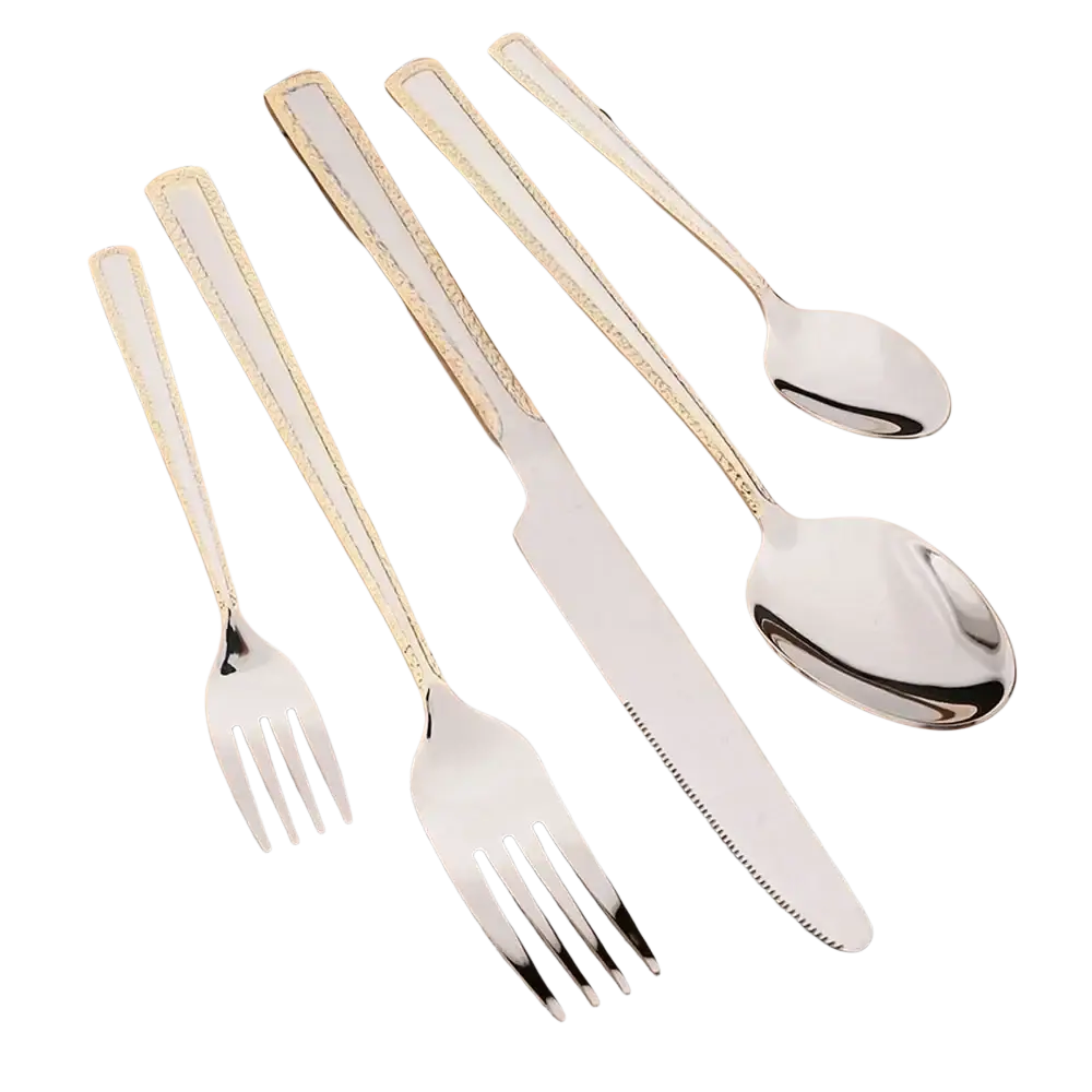 Set of stainless steel cutlery with gold accent flatware featuring elegant handles and a sleek modern design