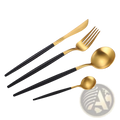 Stainless steel cutlery set with green gold handles featuring black and gold two-tone design for elegant dining