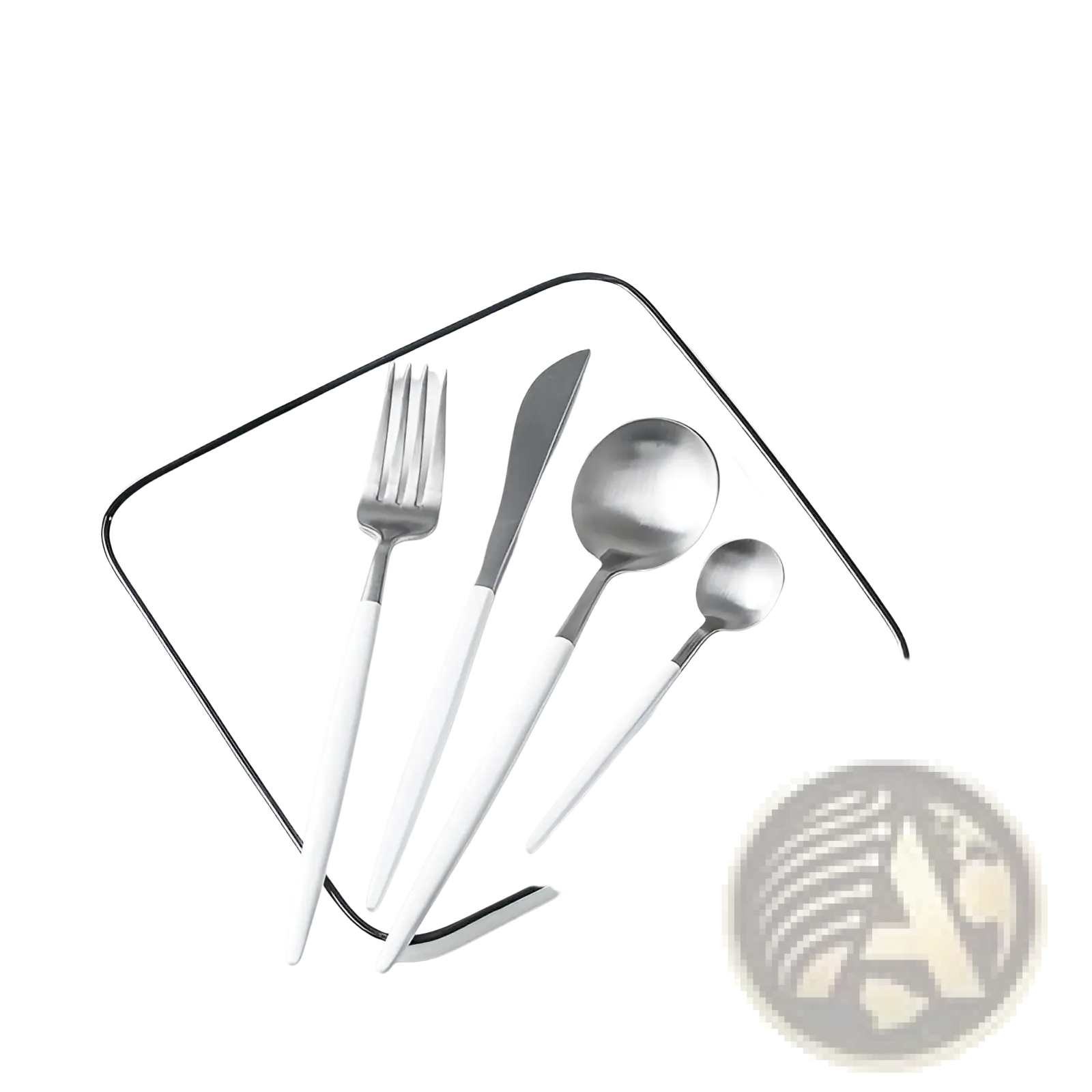 Modern minimalist stainless steel cutlery set with sleek white handles arranged on a square white plate