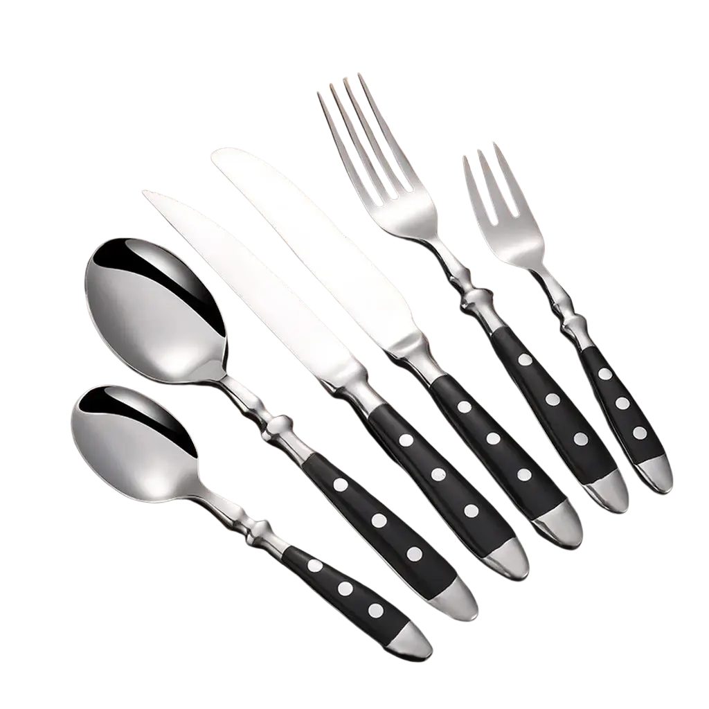 Stainless steel cutlery set with black polka dot handles and silver-toned accents for stylish flatware use