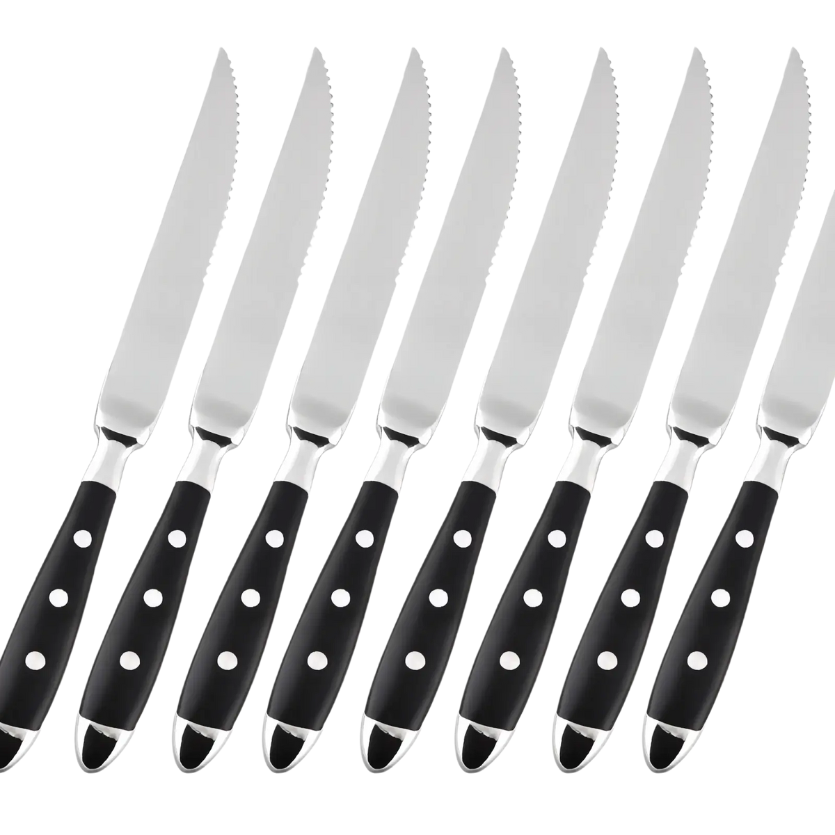 Set of eight stainless steel steak knives with black handles and white dot accents in polka dot flatware design