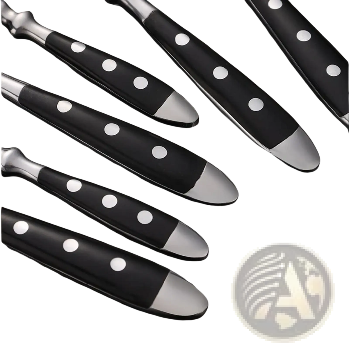 Set of five stainless steel knives with black handles, silver accents, and white polka dots in a modern design
