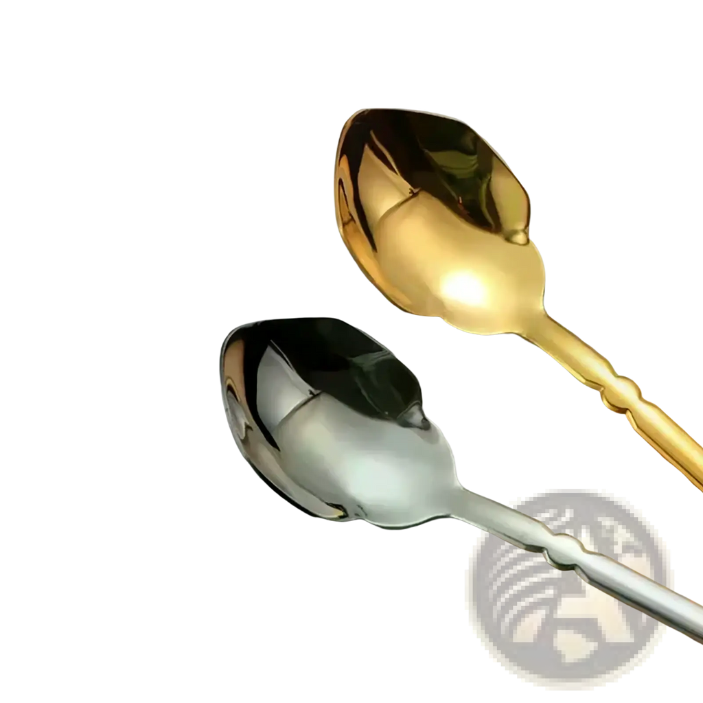Two elegant spoons in polished gold and sleek silver with ornate twisted handles from stainless steel cutlery set with travel case