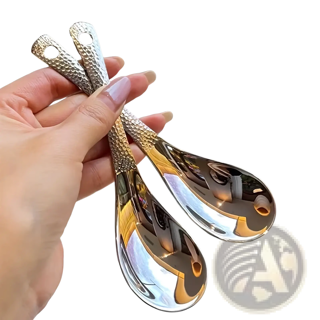 Shiny silver stainless steel dessert spoon set with teardrop shape and hammered texture handles