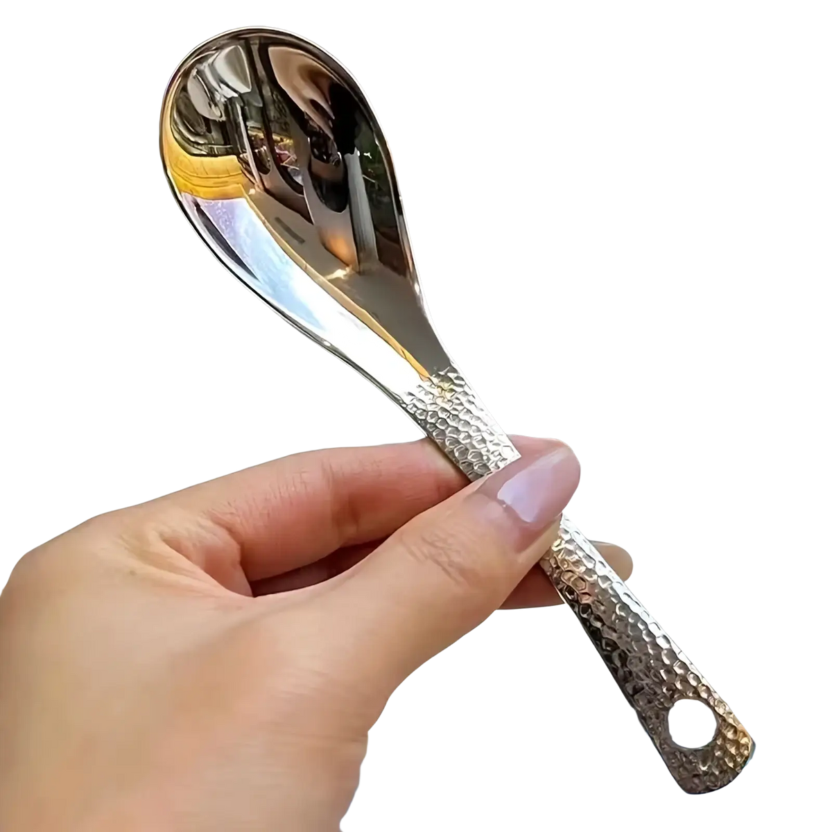 A sleek hammered silver stainless steel dessert spoon with a reflective bowl and textured handle