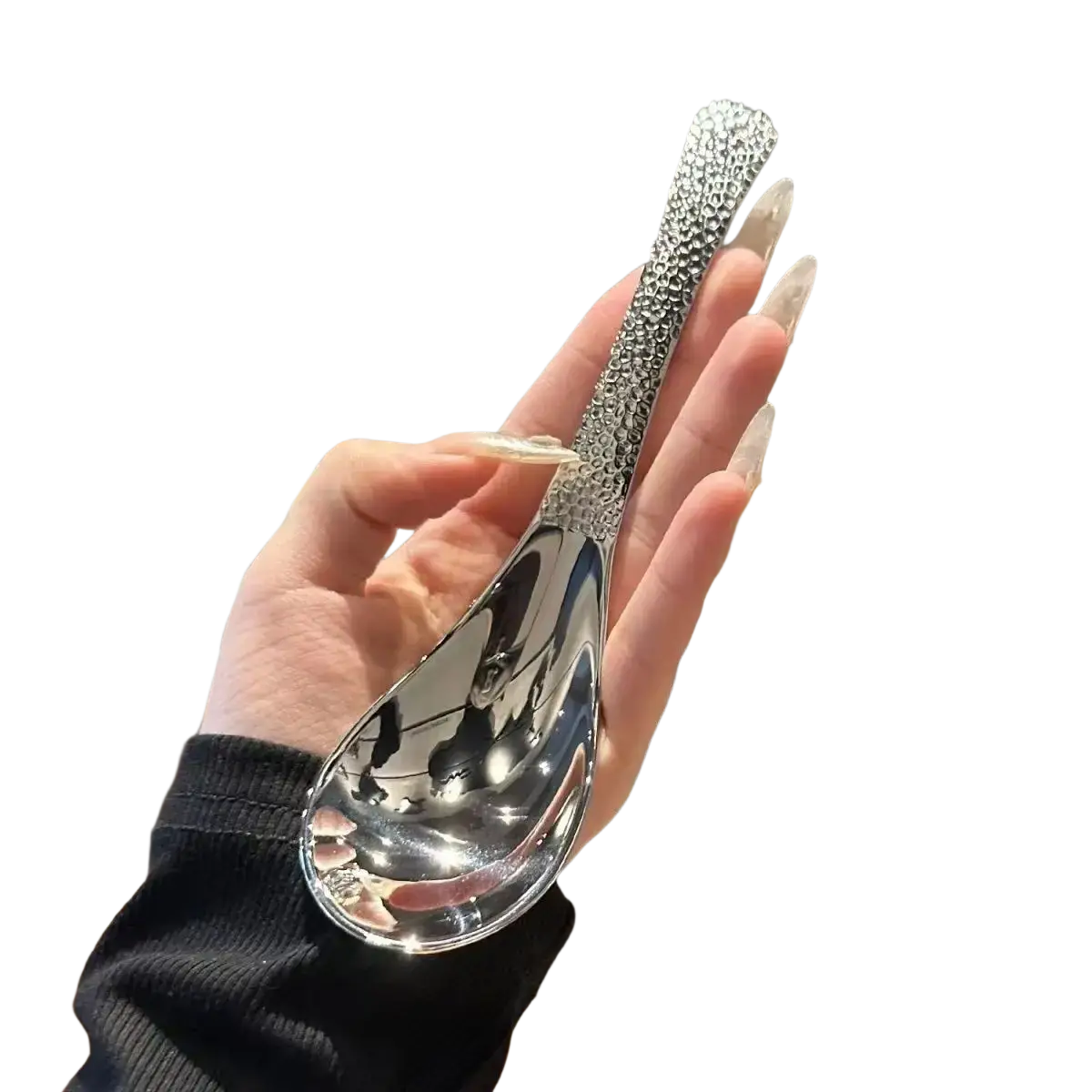 A sleek silver stainless steel dessert spoon with a textured beaded handle and polished reflective bowl