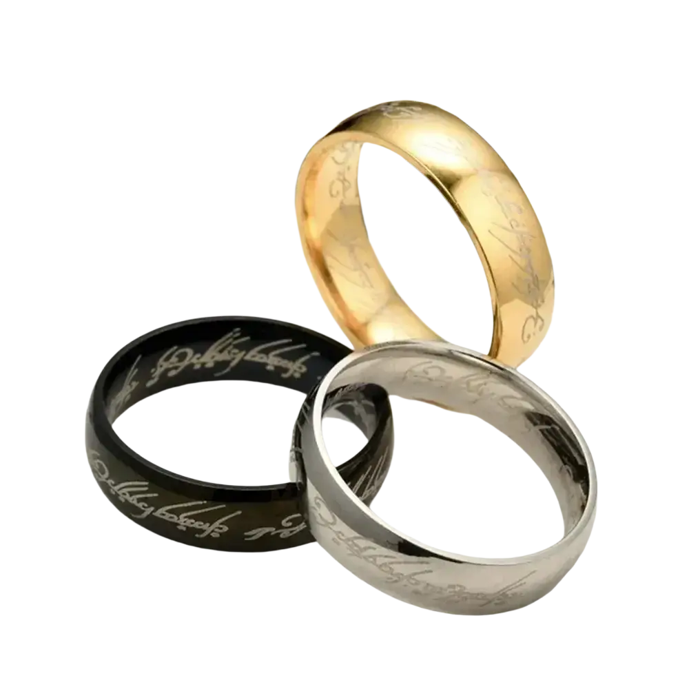 Three stainless steel rings in gold black and silver engraved with elvish script for wedding bands
