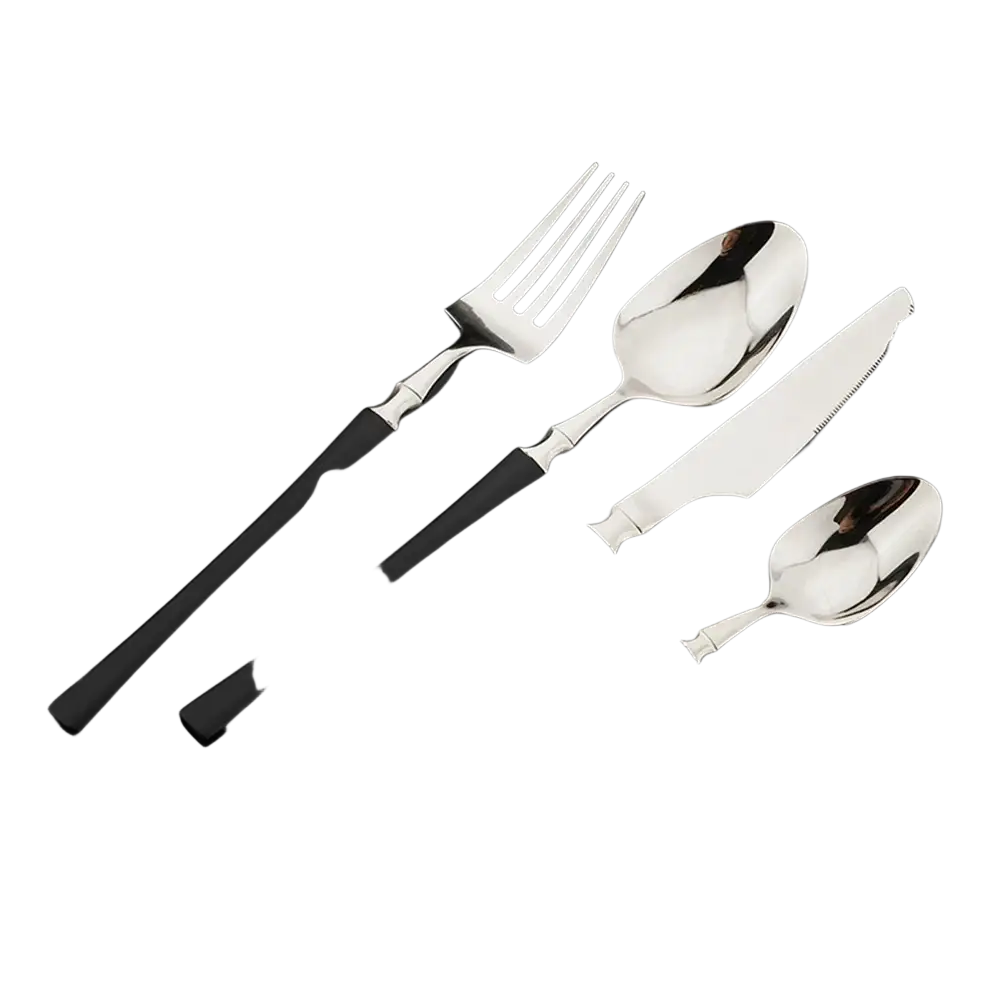 Set of four stainless steel flatware with sleek black handles and polished minimalist design for modern dining
