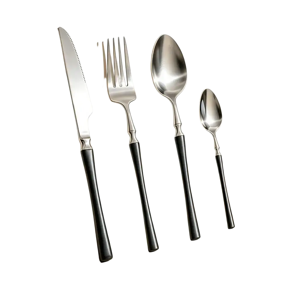 Set of four stainless steel flatware pieces with sleek black handles and minimalist modern cutlery design
