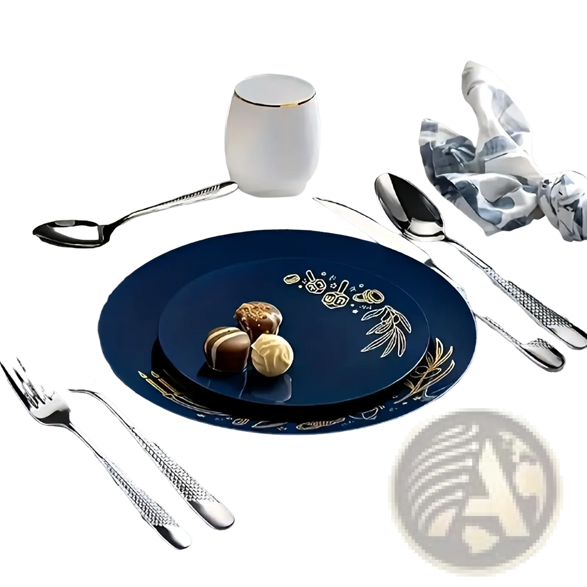 Deep blue ceramic plate with gold leaf floral and fruit motifs paired with stainless steel flatware set 40 piece on table