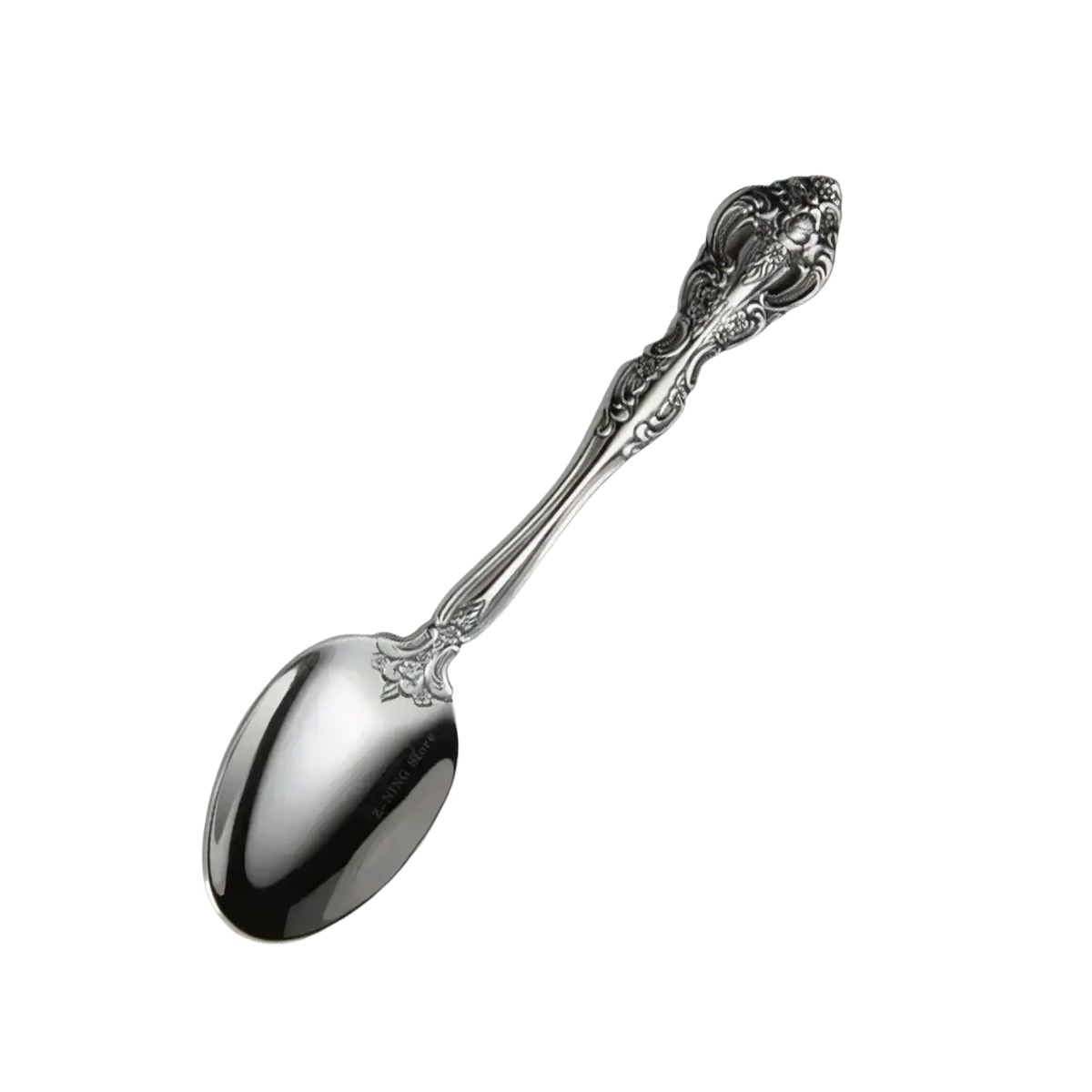 Elegant silver-toned stainless steel spoon with gold inlaid filigree detailing from flatware set