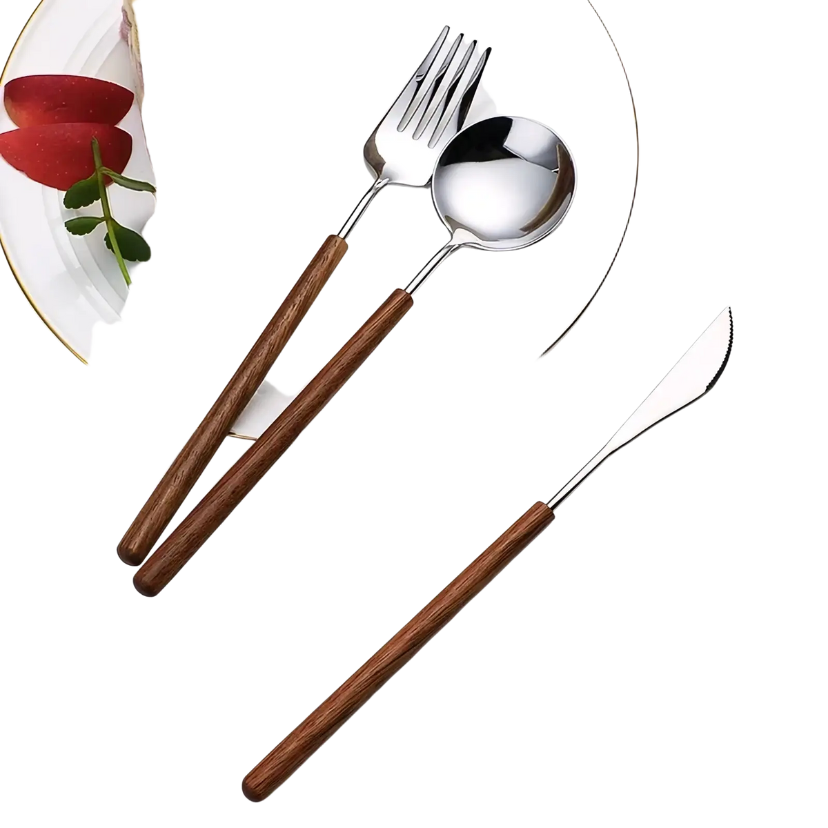 Stainless steel flatware set with warm brown wooden handles arranged on a white plate beside layered cake