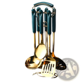 Set of stainless steel gold and teal kitchen utensils with ceramic handles neatly arranged in a matching golden stand