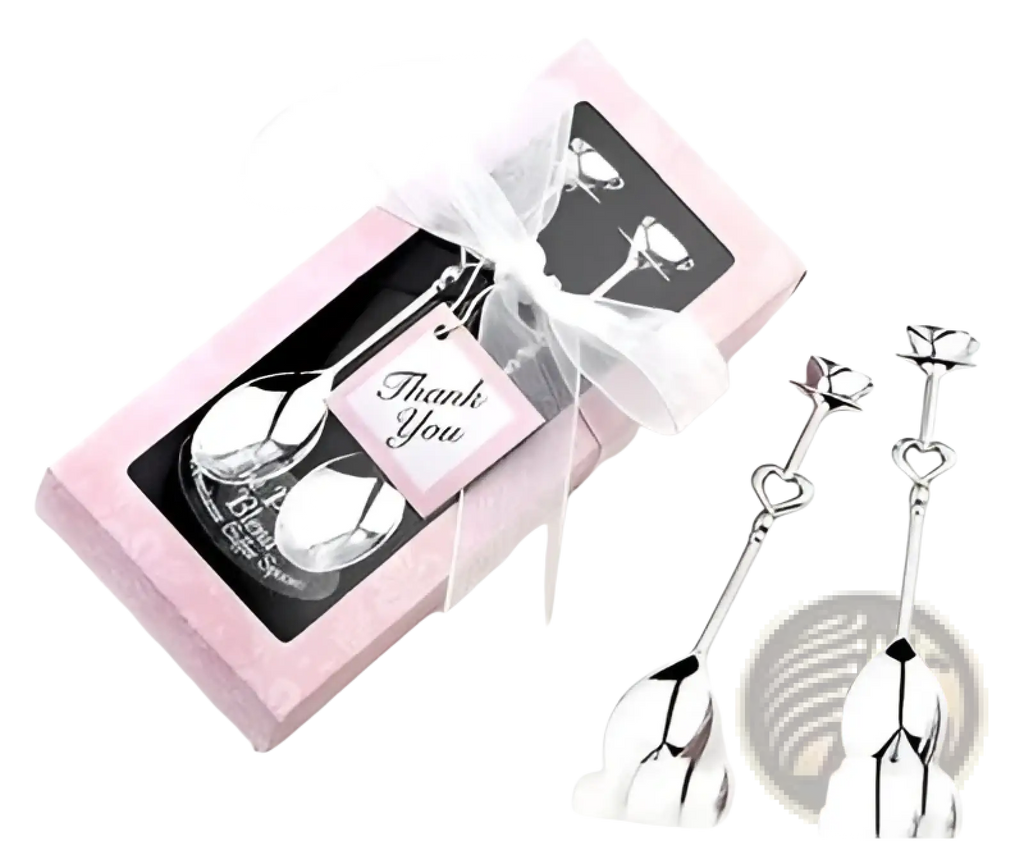 Pink gift box with stainless steel silver heart-shaped dessert spoons and a thank you tag with white ribbon