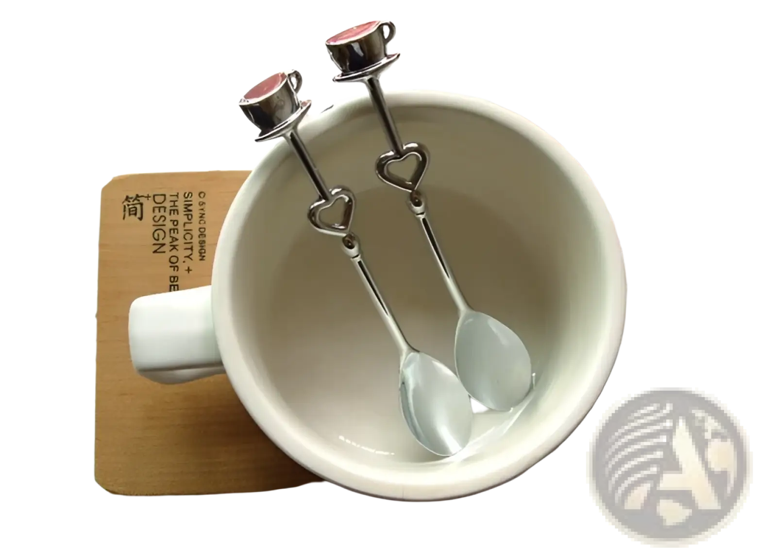 Two silver-toned stainless steel heart coffee spoons with red enamel accented miniature teacup tops and handles