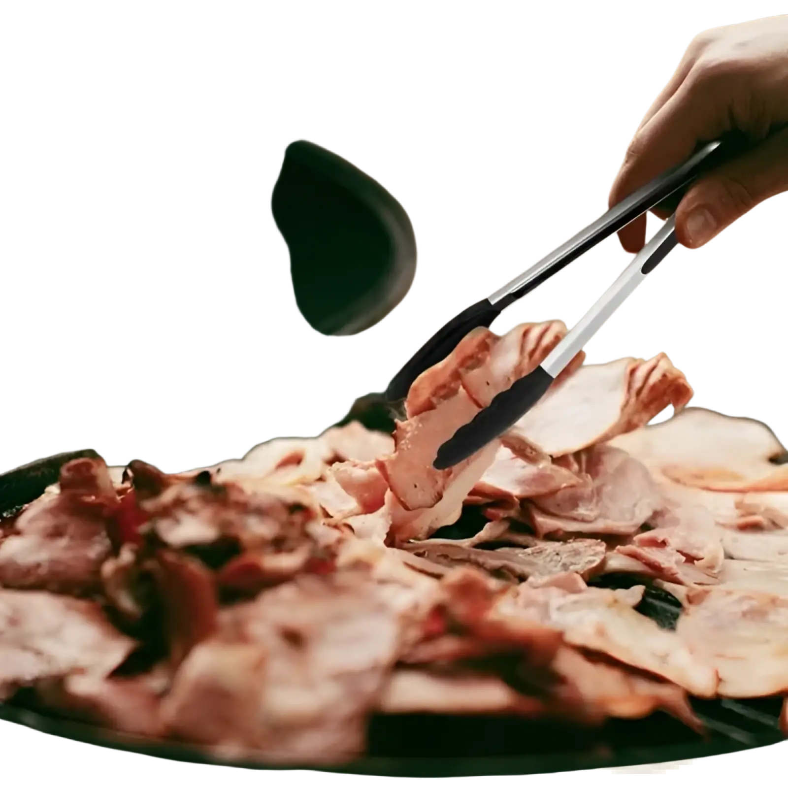 Black and silver stainless steel kitchen tongs with silicone tips holding raw pork belly slices over a grill