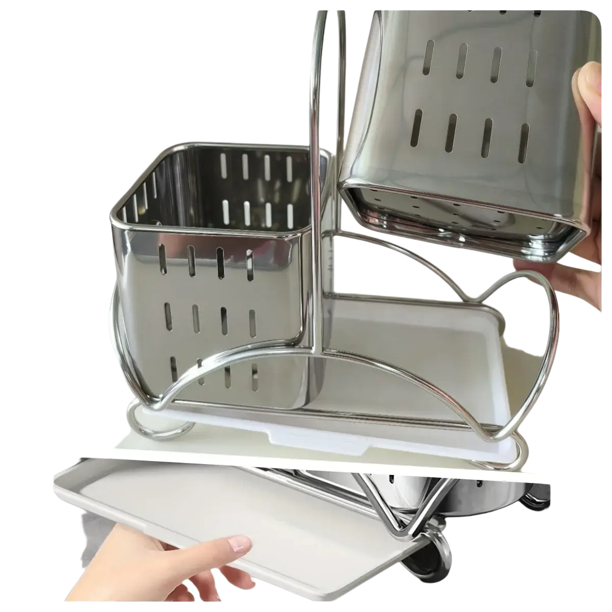 Stainless steel kitchen utensil holder organiser with white plastic tray base and perforated rectangular compartments