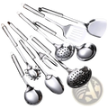 Set of nine stainless steel kitchen utensils with sleek reflective surfaces including spoons ladles and serving fork