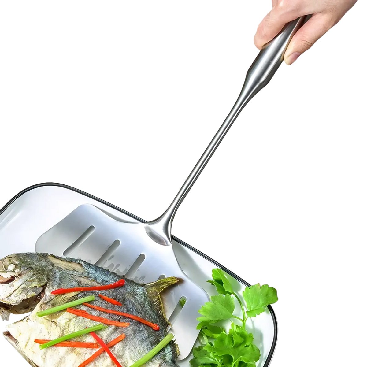 A stainless steel kitchen utensils set includes a sleek silver fish spatula lifting cooked fish from a white enamel dish