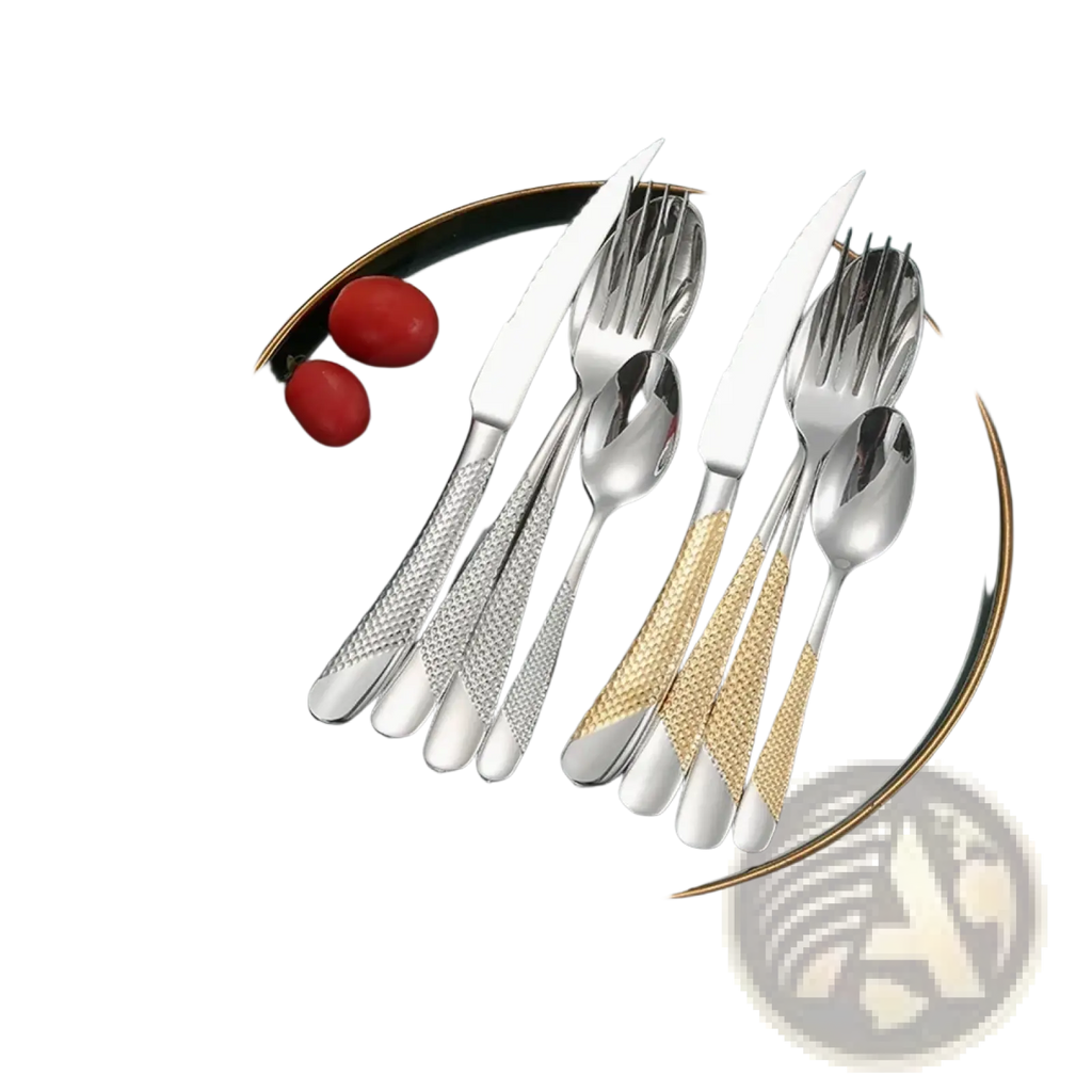 Stainless steel luxury cutlery set with textured silver and gold handles arranged on a dark plate