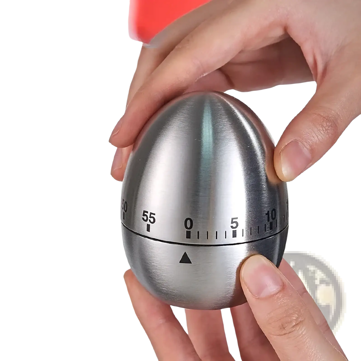 A stainless steel mechanical egg kitchen timer with brushed finish black numerical markings and triangular reset indicator