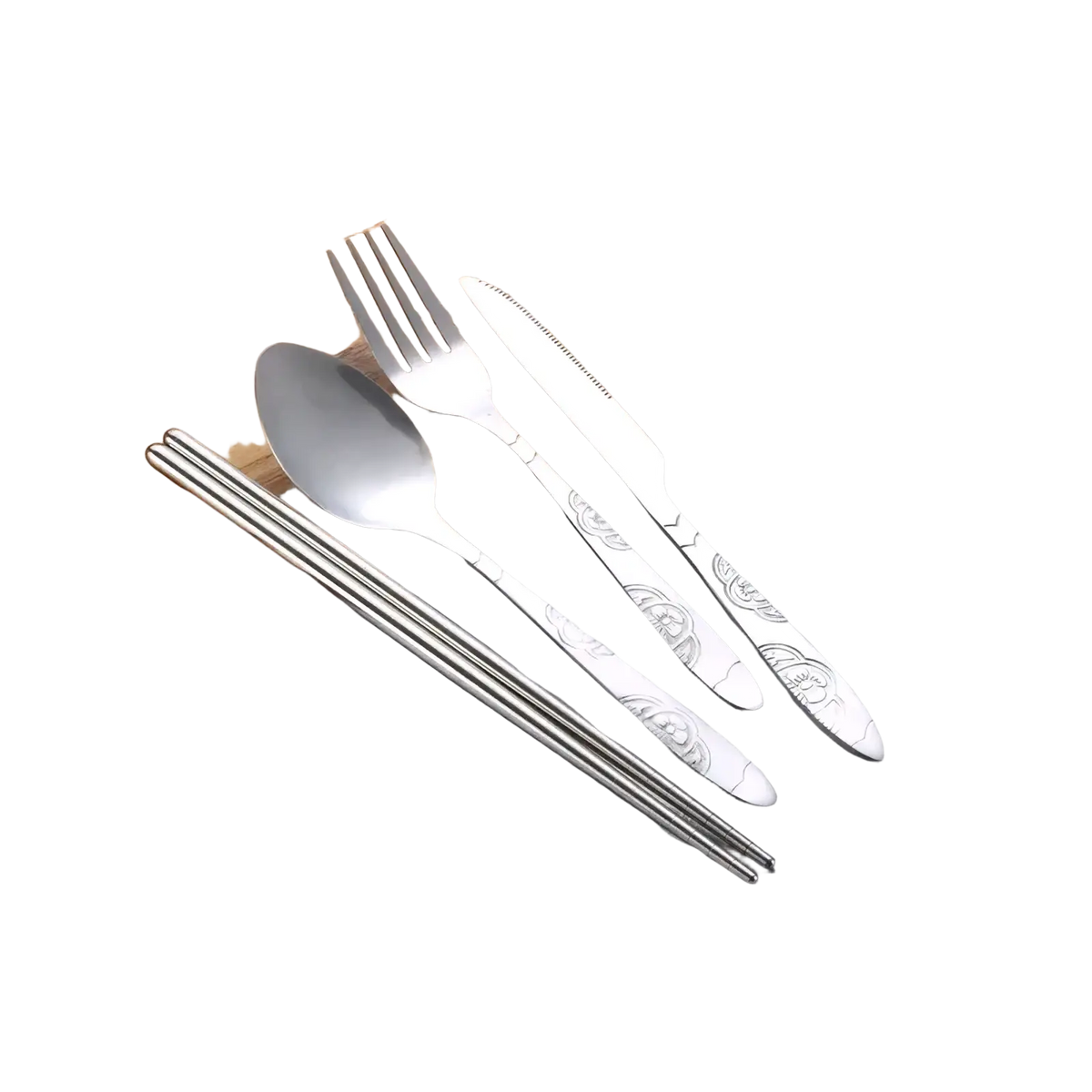 Stainless steel portable travel cutlery set with ornate engraved handles and matching chopsticks on wooden board