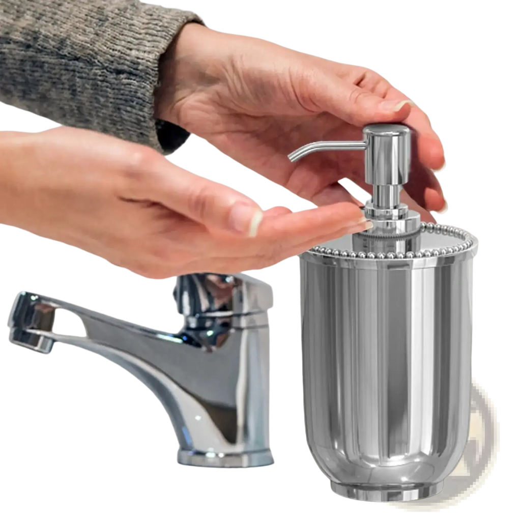 Chrome finished stainless steel soap dispenser pump with fluted cylindrical body and beaded rim for bathroom use