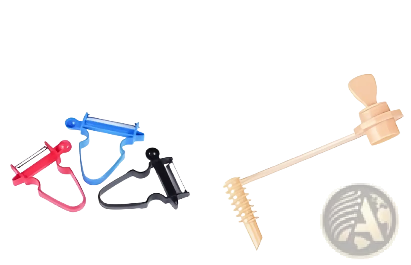 Stainless steel vegetable peeler set with red blue and black peelers and a wooden honey dipper with metal spiral end