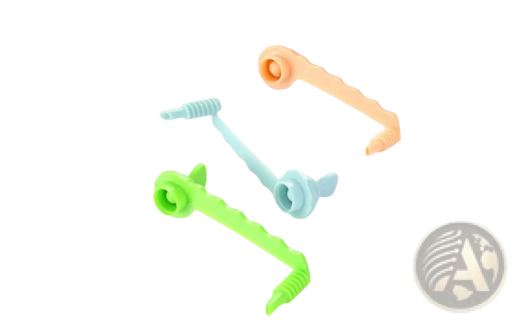 Set of three colorful stainless steel vegetable spiralizers in green light blue and orange for peeling and slicing vegetables