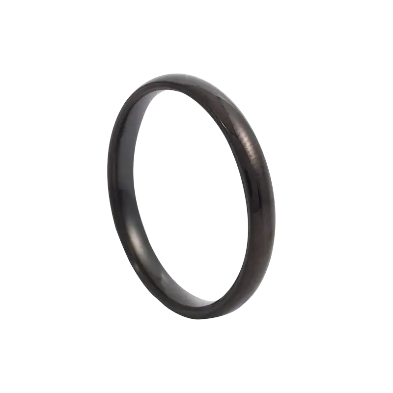 A sleek black tungsten carbide wedding band with polished finish and subtle inner bevel paired with rose gold stainless steel ring