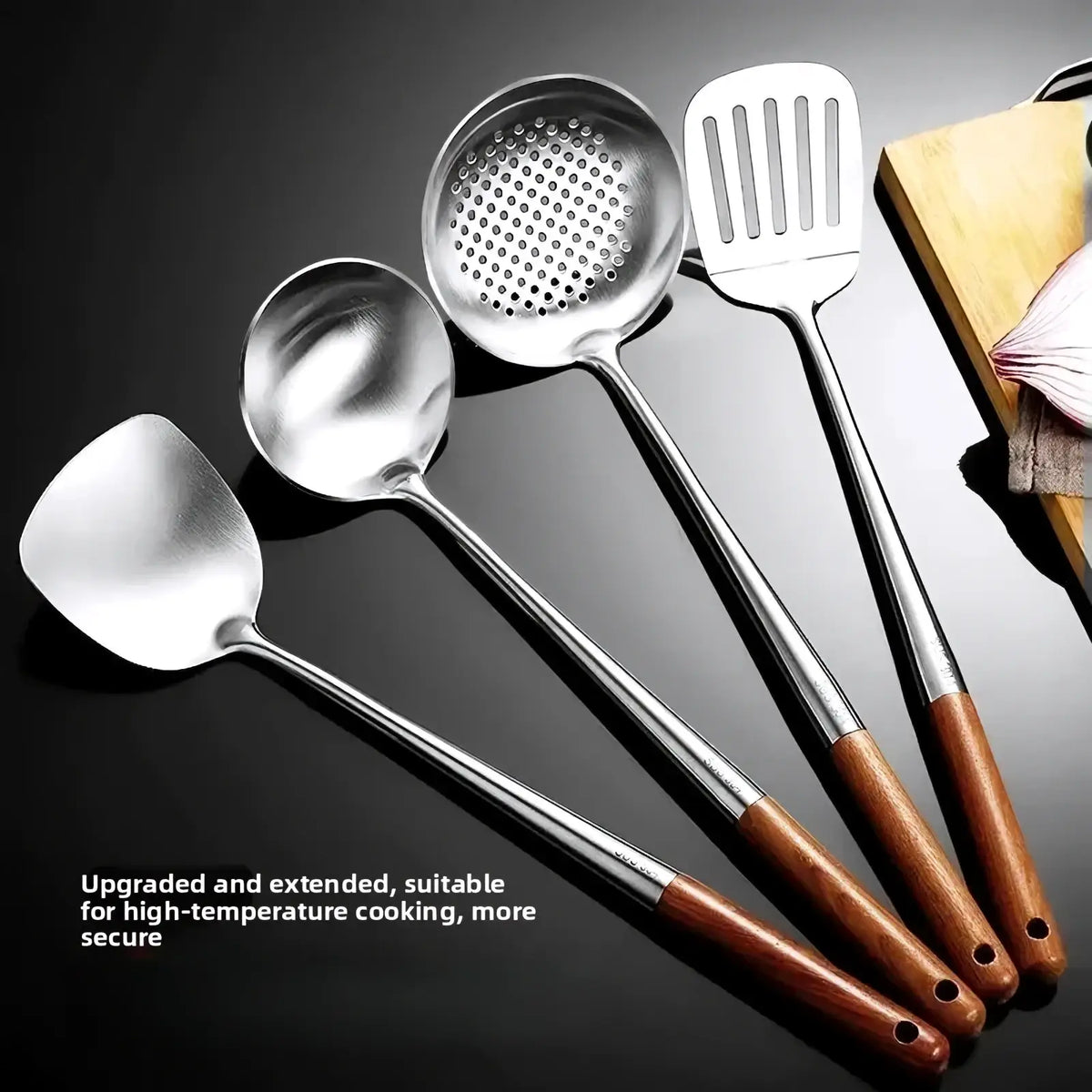 Set of four stainless steel wok cooking utensils with wooden handles including spatula and ladle