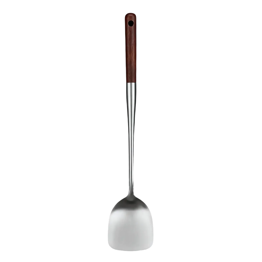 A stainless steel wok spatula with a polished reflective surface and a rich brown wooden handle
