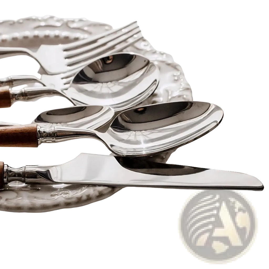 Stainless steel wooden handle cutlery set featuring shiny silver spoons with warm brown handles on a decorative plate