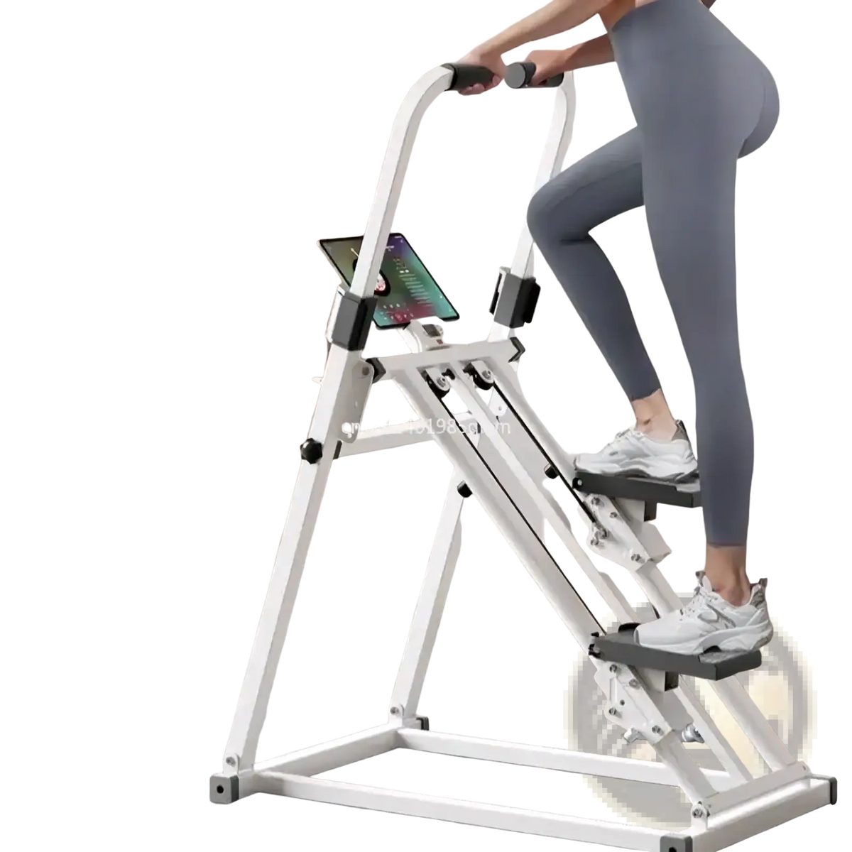 White metal stair climbing machine with black grip handles and gray step platforms for home fitness use