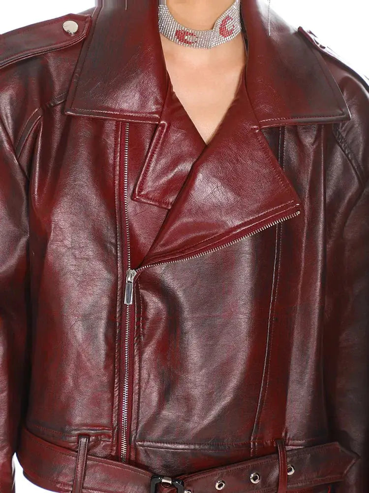 Glossy burgundy stand collar leather moto jacket with rich burgundy leather, classic asymmetrical zipper, and silver hardware