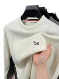 Off-white standard wool striped knit pullover for men with ribbed neckline and embroidered dog patch on chest