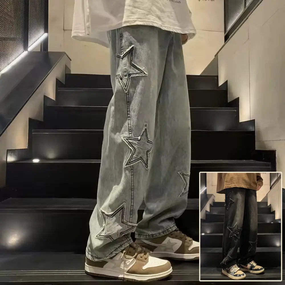 Men’s y2k baggy streetwear jeans in light-wash denim with bold stitched star appliqués down the outer leg